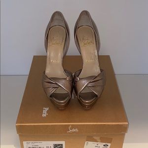 CHRISTIAN LOUBOUTIN | Platform heels